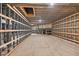 Spacious unfinished basement ready for transformation with metal and wood framing and ample lighting at 1730 Etchison Spur, Loganville, GA 30052