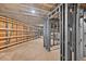 Unfinished basement featuring metal and wood frames, a blank slate for a custom design and build at 1730 Etchison Spur, Loganville, GA 30052