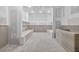 Unfinished basement with concrete floor, gray-toned panels, and utility shelving at 1730 Etchison Spur, Loganville, GA 30052