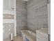 Incomplete bathroom featuring cement board and bathtub, waiting to be transformed into a relaxing space at 1730 Etchison Spur, Loganville, GA 30052