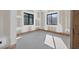 Unfinished room features two windows, ready to be transformed into a dream bedroom at 1730 Etchison Spur, Loganville, GA 30052