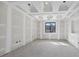 Unfinished bedroom features a ceiling with tray design and one window for natural light at 1730 Etchison Spur, Loganville, GA 30052