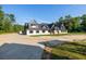 Spacious new construction with an extended driveway and ample land, perfect for a growing Gathering or entertaining guests at 1730 Etchison Spur, Loganville, GA 30052