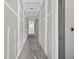 Long hallway with visible lighting, and unpainted drywall walls and ceiling at 1730 Etchison Spur, Loganville, GA 30052