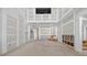 Spacious living room shows construction with drywall and recessed lighting at 1730 Etchison Spur, Loganville, GA 30052