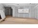 Open living room with prepped walls, recessed lighting, and view windows at 1730 Etchison Spur, Loganville, GA 30052