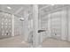 Spacious open area with recessed lighting, pillars and a cut out for a wet bar at 1730 Etchison Spur, Loganville, GA 30052