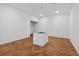 Unfinished room features gorgeous herringbone floors, recessed lighting and is freshly painted at 1730 Etchison Spur, Loganville, GA 30052