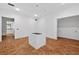 Open room with hardwood floors and white walls at 1730 Etchison Spur, Loganville, GA 30052