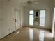 Bedroom featuring multiple windows, tile flooring, and a ceiling fan at 2641 Old Norcross Rd, Tucker, GA 30084