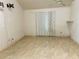 Bedroom featuring a ceiling fan, tiled floors, and light filtering curtains on the window at 2641 Old Norcross Rd, Tucker, GA 30084