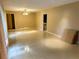 Open-concept living room with tile flooring and a ceiling fan at 2641 Old Norcross Rd, Tucker, GA 30084