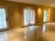 Bright living room with tile floors, natural light, and sliding doors at 2641 Old Norcross Rd, Tucker, GA 30084