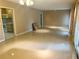 Open-concept living and kitchen space featuring tile flooring and natural light at 2641 Old Norcross Rd, Tucker, GA 30084