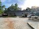 Spacious backyard featuring an extensive patterned concrete patio perfect for outdoor seating and entertainment at 284 Regal Dr, Lawrenceville, GA 30046
