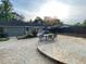 Expansive backyard boasting a textured concrete patio, ideal for outdoor gatherings and relaxation at 284 Regal Dr, Lawrenceville, GA 30046