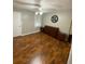Spacious bedroom featuring hardwood floors and a large dresser at 284 Regal Dr, Lawrenceville, GA 30046