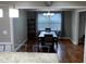 Inviting dining room with natural light and hardwood floors at 284 Regal Dr, Lawrenceville, GA 30046