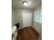 Welcoming foyer featuring a closet and a glass-paneled front door at 284 Regal Dr, Lawrenceville, GA 30046