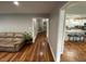 Hallway view leading to the updated kitchen at 284 Regal Dr, Lawrenceville, GA 30046