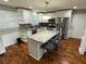 Modern kitchen with granite countertops, stainless steel appliances and a center island with seating at 284 Regal Dr, Lawrenceville, GA 30046