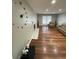 Bright living room featuring wood floors, a fireplace, and recessed lighting at 284 Regal Dr, Lawrenceville, GA 30046