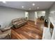 Spacious living room featuring hardwood floors and a cozy fireplace at 284 Regal Dr, Lawrenceville, GA 30046