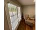 Inviting living room featuring natural light and hardwood floors, creating a warm and comfortable space at 284 Regal Dr, Lawrenceville, GA 30046