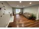 Cozy living room features a fireplace, hardwood floors, and comfortable seating near French doors at 284 Regal Dr, Lawrenceville, GA 30046
