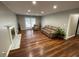 Inviting living room with a cozy seating area, a fireplace, and access to a backyard through French doors at 284 Regal Dr, Lawrenceville, GA 30046