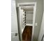 Spacious walk-in closet with custom shelving for organized storage at 284 Regal Dr, Lawrenceville, GA 30046