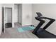 Exercise room with treadmill and yoga mat at 3717 Blue Goose Ln, Loganville, GA 30052