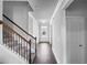 Hallway with stairs and front door at 3717 Blue Goose Ln, Loganville, GA 30052