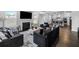 Spacious living room with fireplace, comfortable seating, and open layout to the kitchen, perfect for gatherings at 3717 Blue Goose Ln, Loganville, GA 30052
