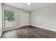 Comfortable bedroom with closet space and a large window at 3753 Eli Dr, Snellville, GA 30039