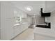Modern kitchen boasting sleek countertops and ample cabinet space at 3753 Eli Dr, Snellville, GA 30039