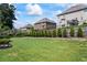 Enjoy the expansive, well-maintained backyard with lush green grass and mature landscaping at 3952 Dragon Fly Ln, Loganville, GA 30052