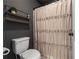 Comfortable bathroom features neutral walls, a toilet, and a decorative shower curtain at 3952 Dragon Fly Ln, Loganville, GA 30052