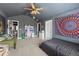 This bedroom features carpet floors, a ceiling fan, and neutral walls creating a calming atmosphere at 3952 Dragon Fly Ln, Loganville, GA 30052