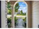 View from front porch looking out to a beautifully landscaped yard and street at 3952 Dragon Fly Ln, Loganville, GA 30052