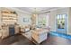 Cozy seating area with chandelier lighting and a drink preparation area is great for entertaining at 3952 Dragon Fly Ln, Loganville, GA 30052