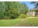 Large back yard with mature trees and well maintained lawn at 1105 Tom Lane Ln, Marietta, GA 30066