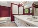 Beautiful primary bathroom features a tub, walk-in shower, and a double sink vanity at 1105 Tom Lane Ln, Marietta, GA 30066