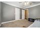 Comfortable bedroom features neutral tones and plenty of closet space at 1105 Tom Lane Ln, Marietta, GA 30066