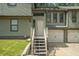 Inviting home exterior showcasing a beautiful entrance, garage, and well-maintained landscaping at 1105 Tom Lane Ln, Marietta, GA 30066