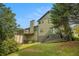 Two-story home featuring a deck and steps to the backyard at 1105 Tom Lane Ln, Marietta, GA 30066