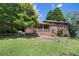 Expansive backyard with mature trees provides a private and serene setting at 255 Jade Cove Dr, Roswell, GA 30075