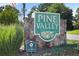 Stone entrance sign to the Pine Valley community at 255 Jade Cove Dr, Roswell, GA 30075