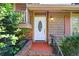Inviting front entrance with a white door featuring an oval glass insert and a classic design at 255 Jade Cove Dr, Roswell, GA 30075