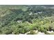 Serene wooded neighborhood, aerial view showcasing multiple houses nestled among towering trees at 562 Pine Valley Se Rd, Marietta, GA 30067